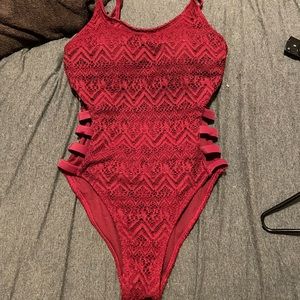 Maroon Strappy, lace one piece bathing suit. Worn once